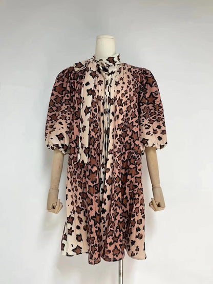 Robe trapèze élégante à manches bouffantes et col noué pour femme