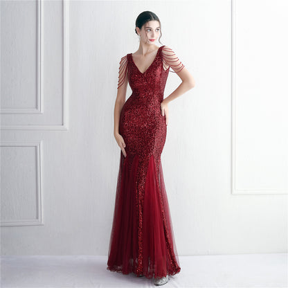 Robe de soirée longue en maille à paillettes et perles