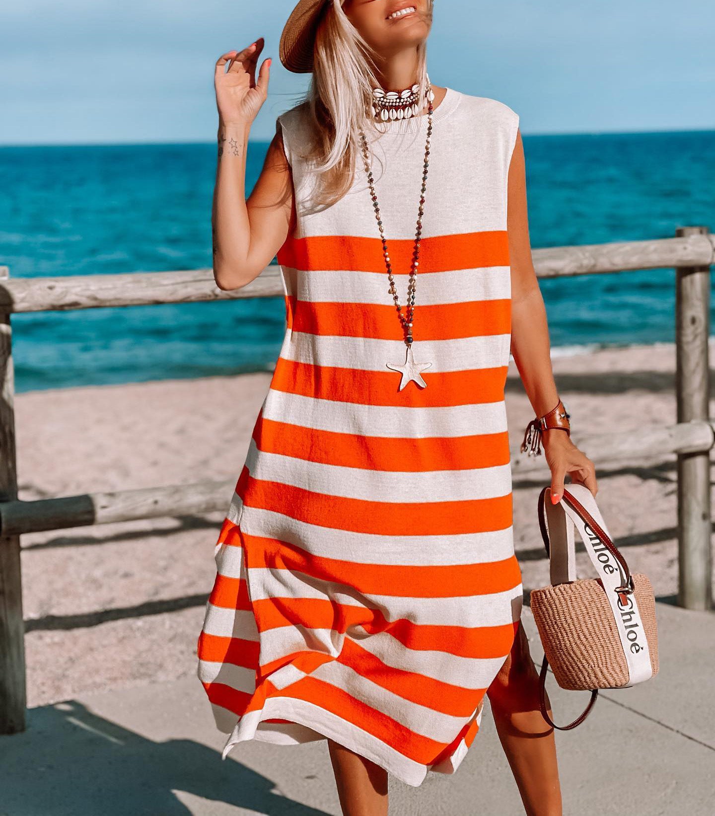 Robe tricotée sans manches à rayures fraîches et audacieuses pour les vacances des femmes