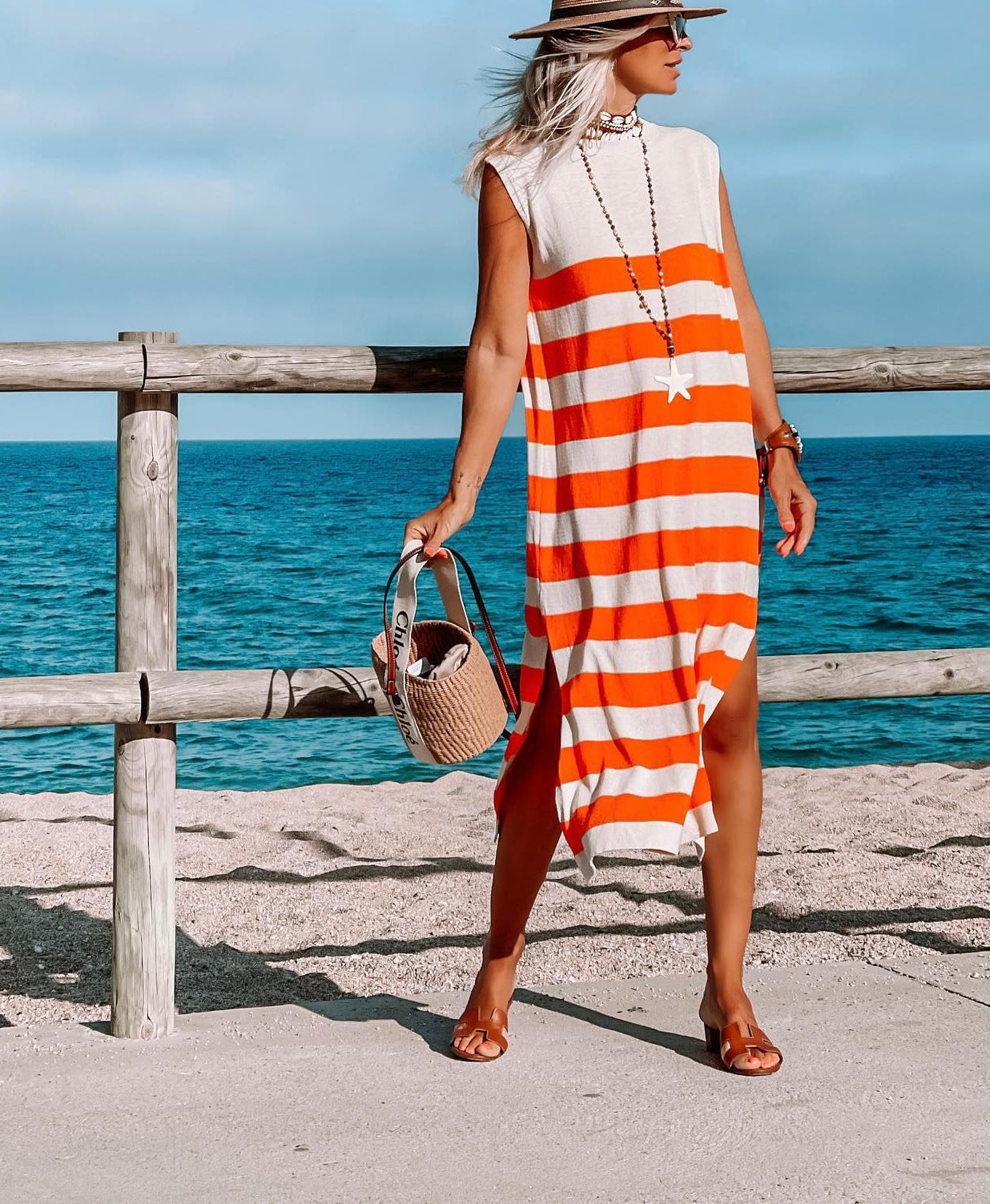 Robe tricotée sans manches à rayures fraîches et audacieuses pour les vacances des femmes