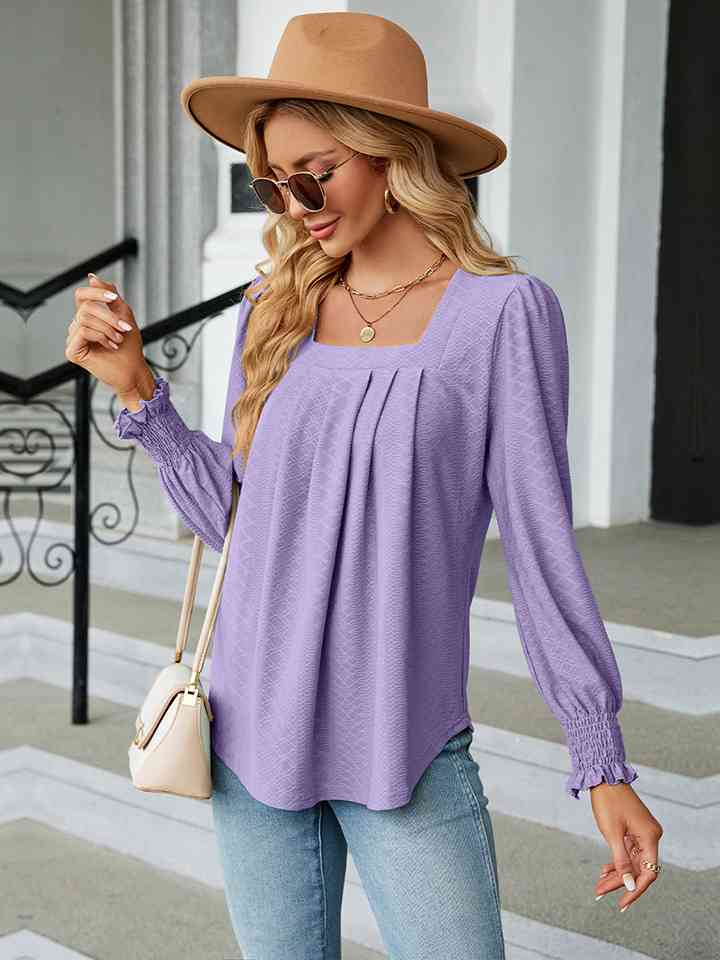 Blusa con cuello cuadrado y manga abullonada