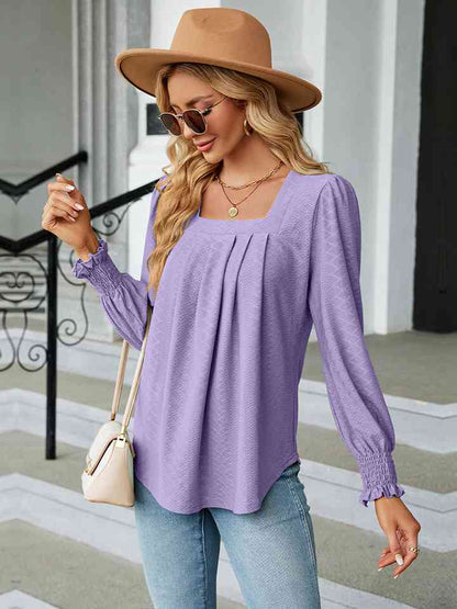 Blusa con cuello cuadrado y manga abullonada