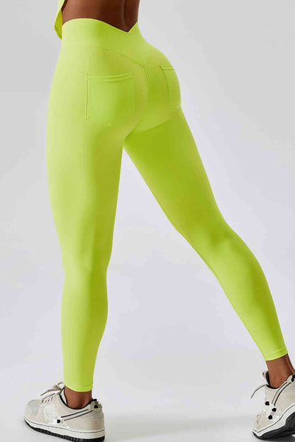 Legging de sport coupe slim avec large ceinture et poche arrière