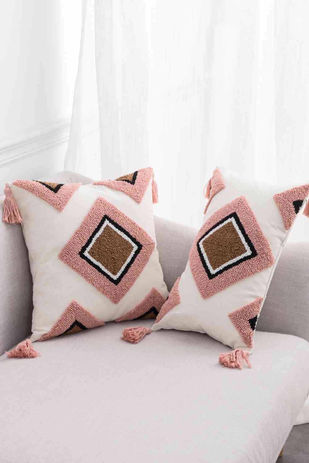 Funda de almohada decorativa con borlas y gráficos geométricos
