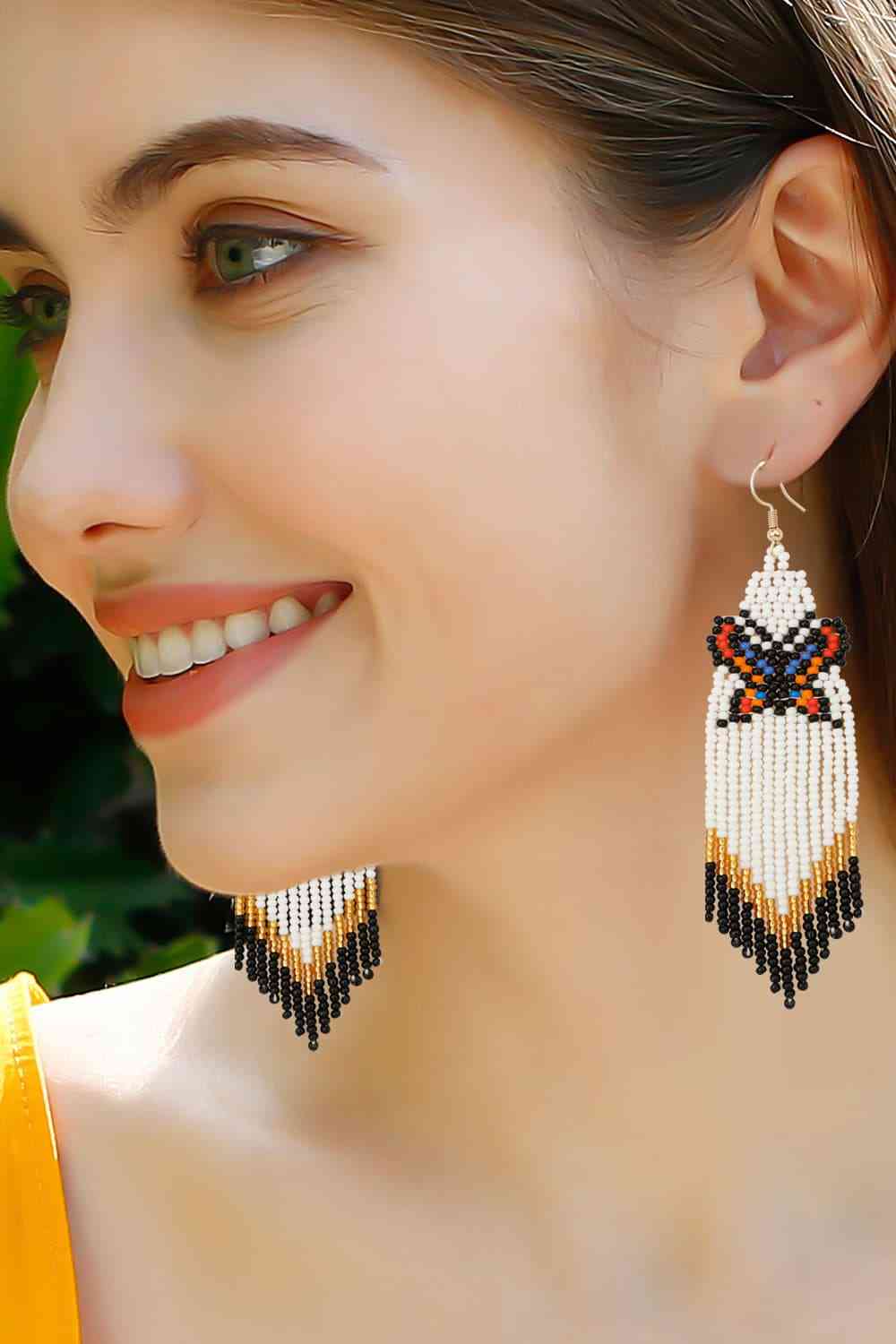 Boucles d'oreilles pendantes en perles papillon