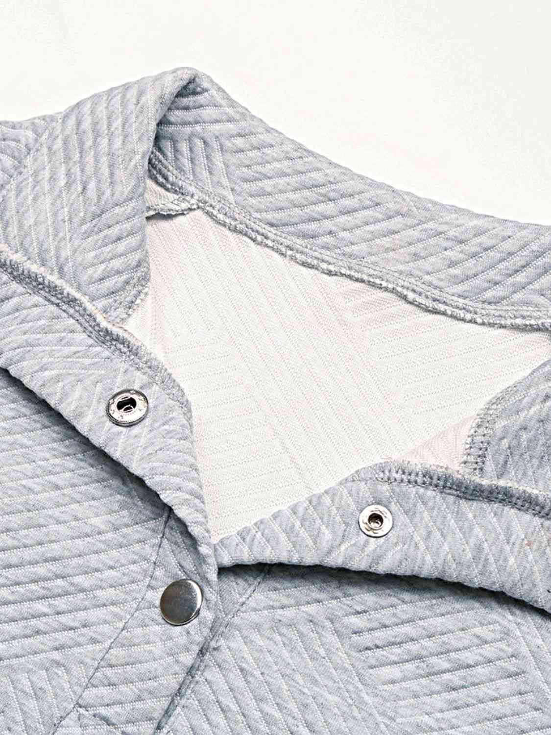 Sudadera con cuello medio abotonado y bolsillo