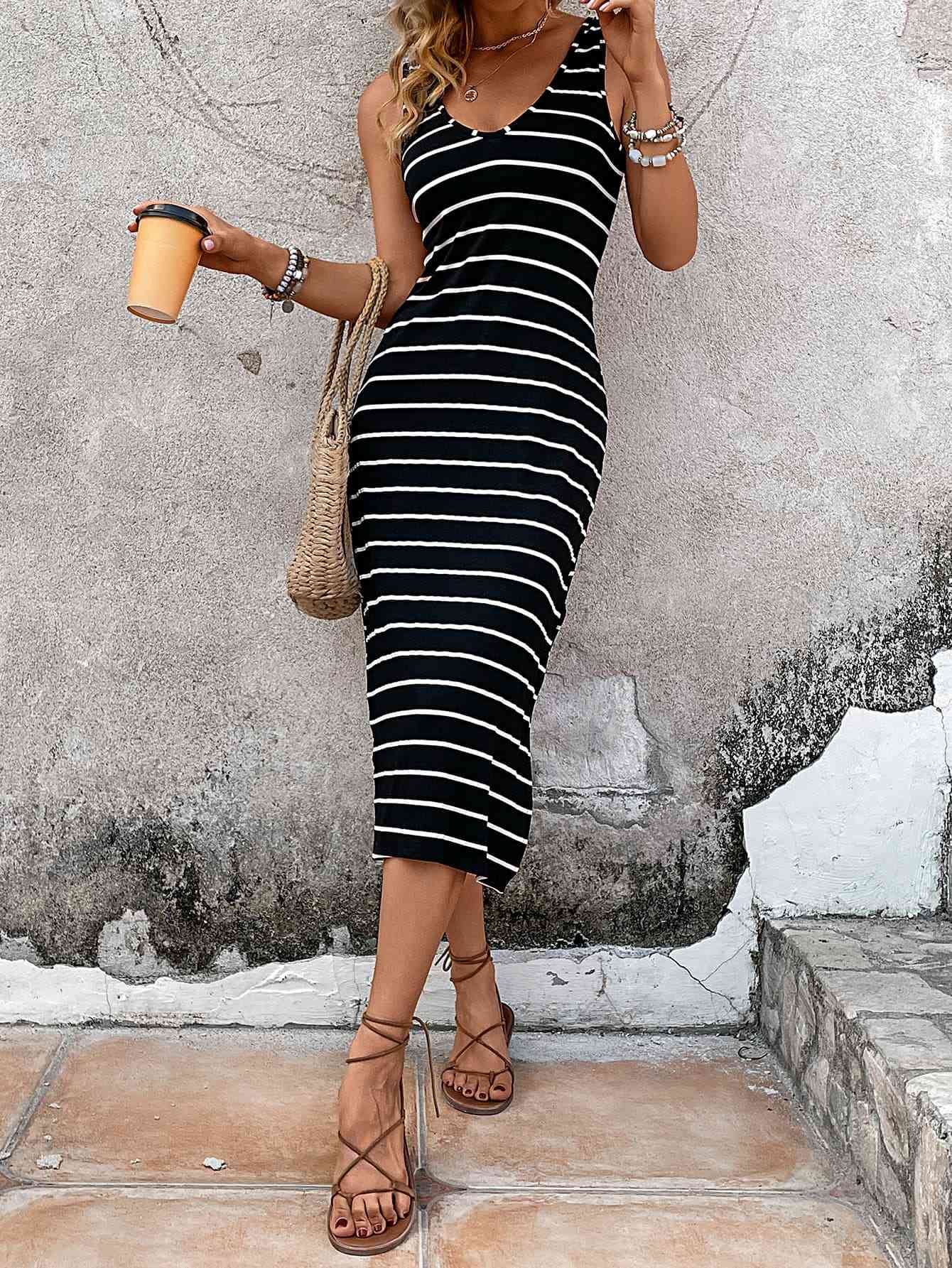 Vestido midi sin mangas con abertura lateral a rayas