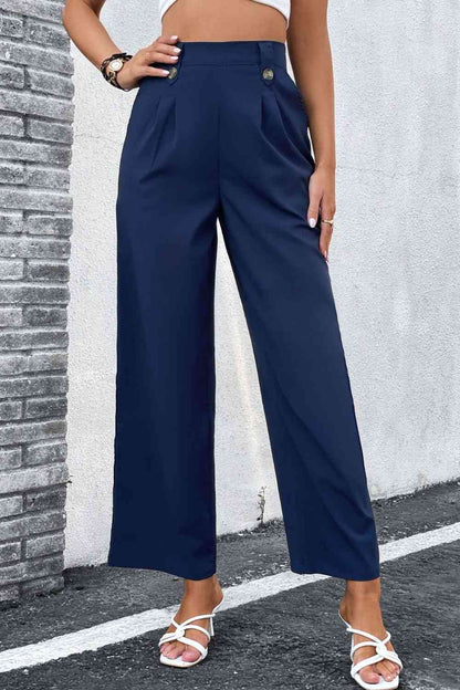 Pantalones anchos con cintura plisada y talle alto