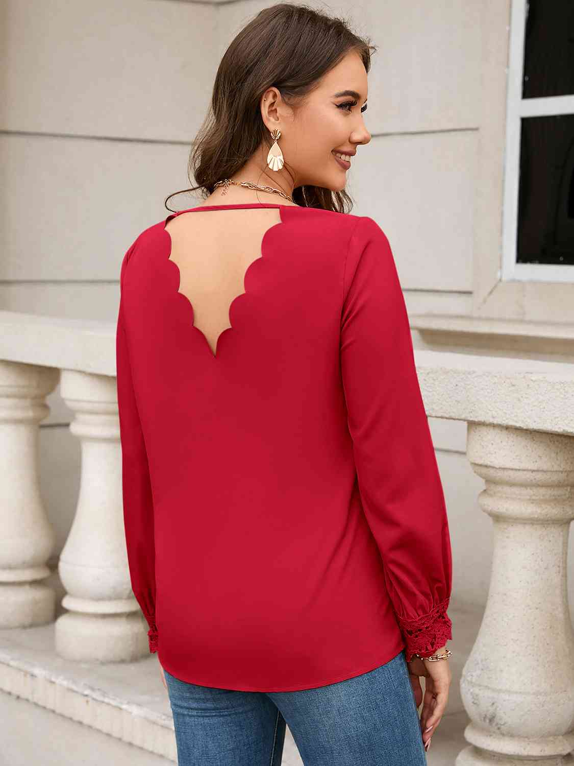 Blusa de manga larga con cuello en V