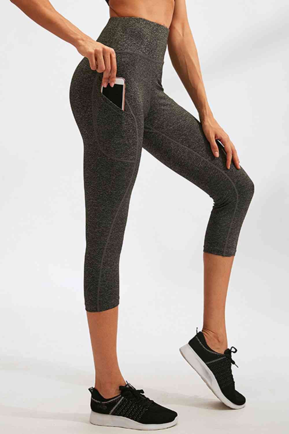 Legging actif coupe slim à large taille et poches