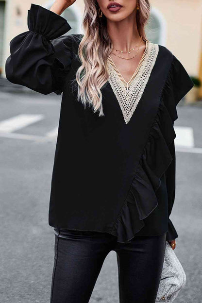 Blusa con cuello en V y manga con volante