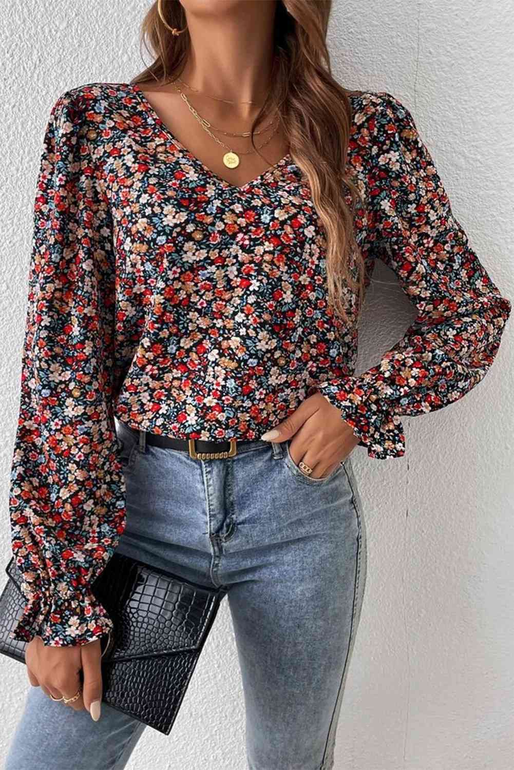 Blusa de manga larga estampada con cuello en V