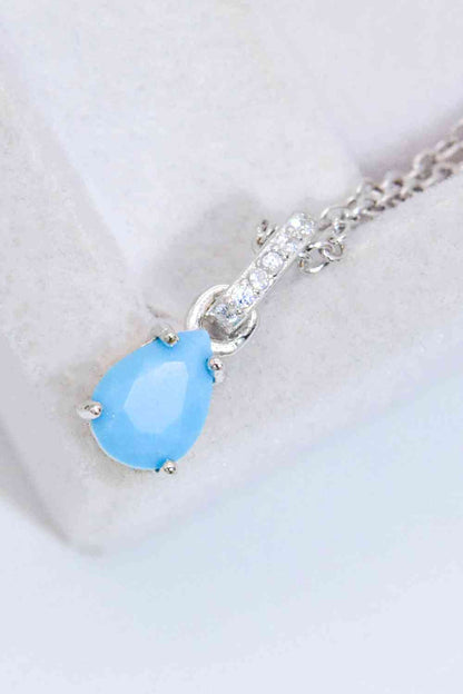 Collier pendentif à 4 griffes en forme de larme turquoise