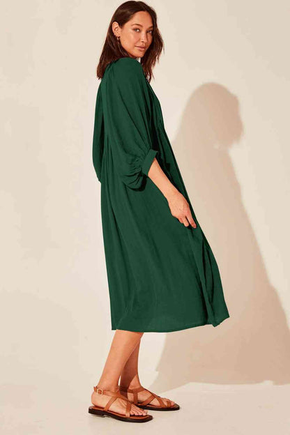 Robe mi-longue à manches lanternes et col noué