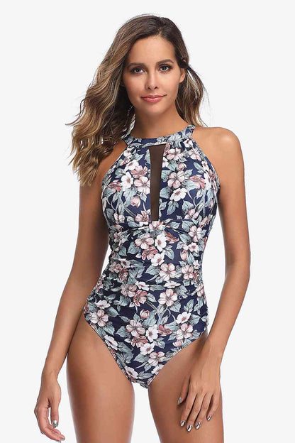 Traje de baño de una pieza floral con espalda abierta