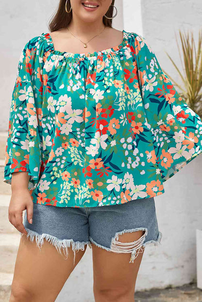 Blusa floral con hombros descubiertos y talla grande