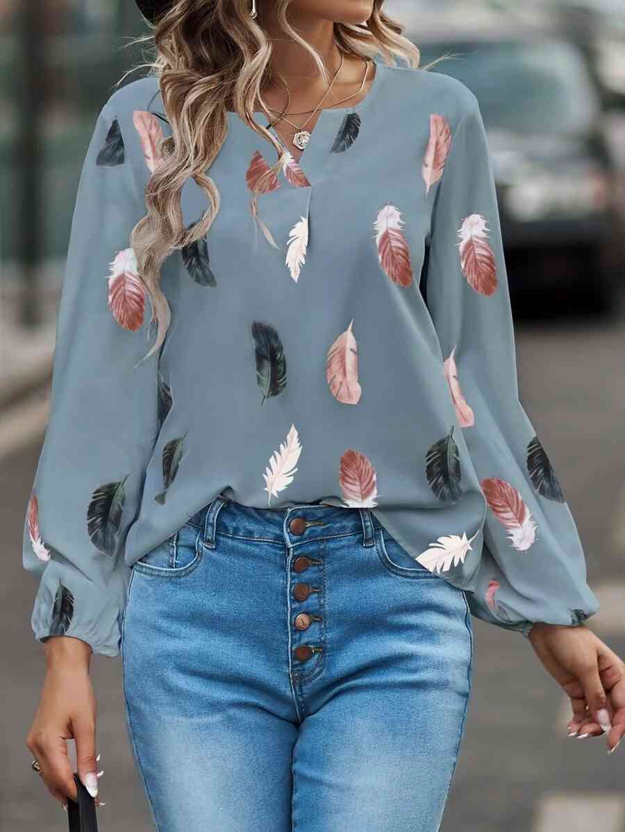 Blusa estampada de manga larga con cuello con muescas