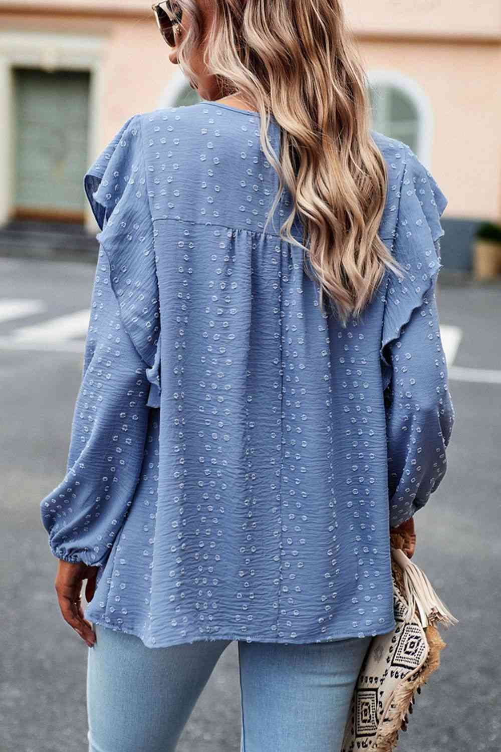 Blusa con manga globo y ribete de volantes