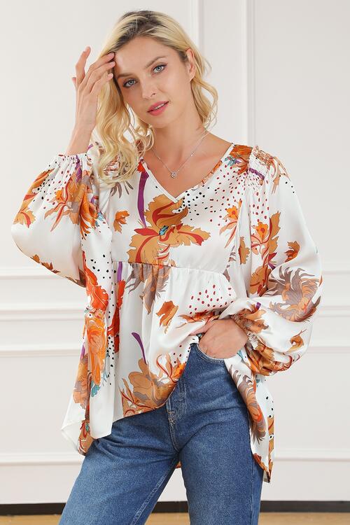 Blouse imprimée à col en V et manches ballon smockées