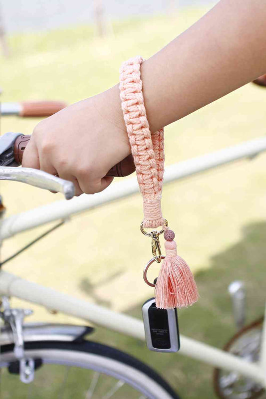 Porte-clés avec bracelet et pompon