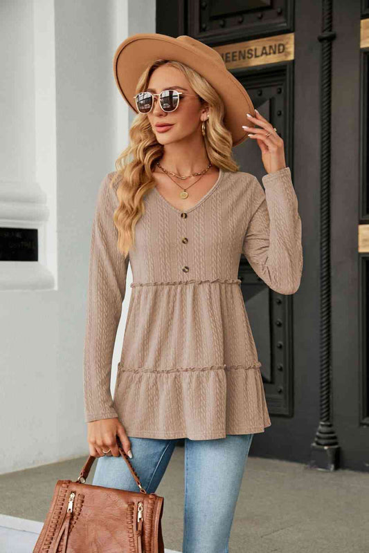 Blouse en tricot torsadé à manches longues et col en V