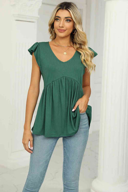 Blusa babydoll con mangas acampanadas y cuello en V