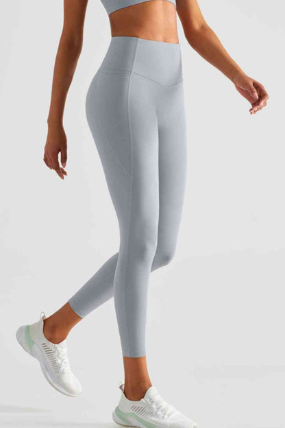 Leggings deportivos de cintura ancha con bolsillos