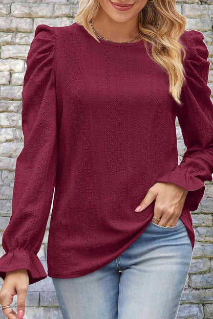 Blouse à manches bouffantes et col rond