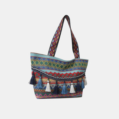 Bolso tote estampado con detalle de borlas