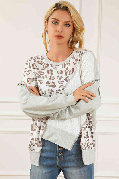 Sudadera con cuello redondo y costuras expuestas de leopardo