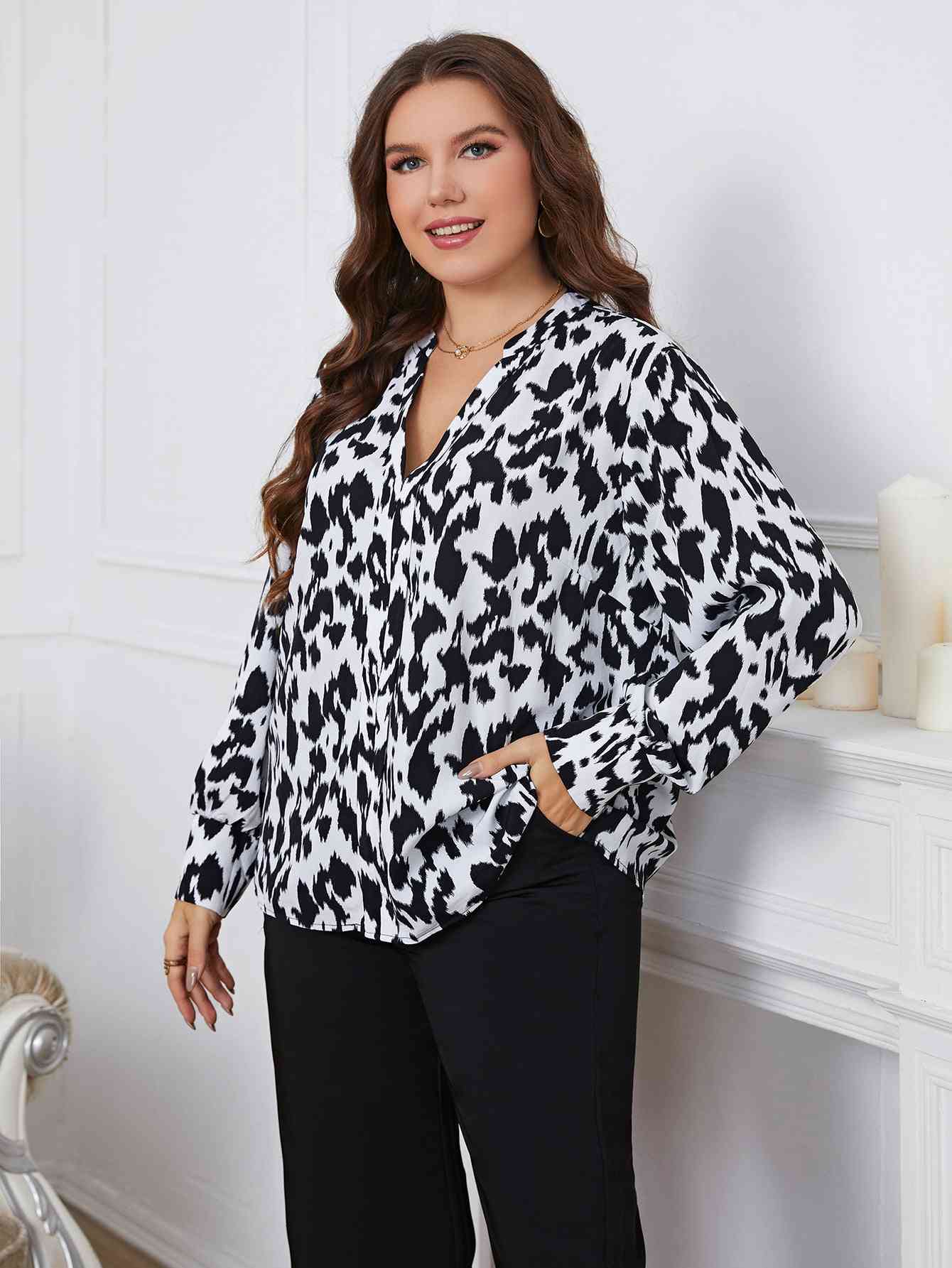 Melo Apparel Blouse imprimée à manches longues et col en V grande taille