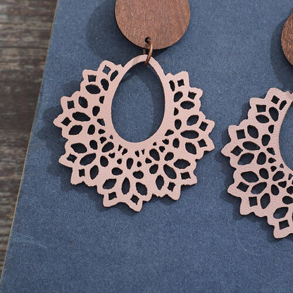 Boucles d'oreilles pendantes à découpe géométrique