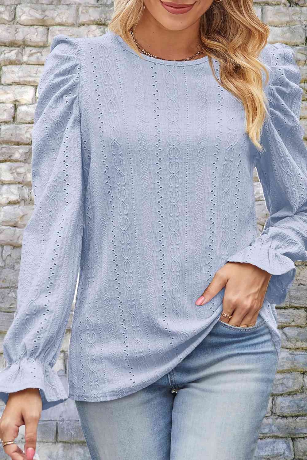 Blusa con cuello redondo y manga abullonada