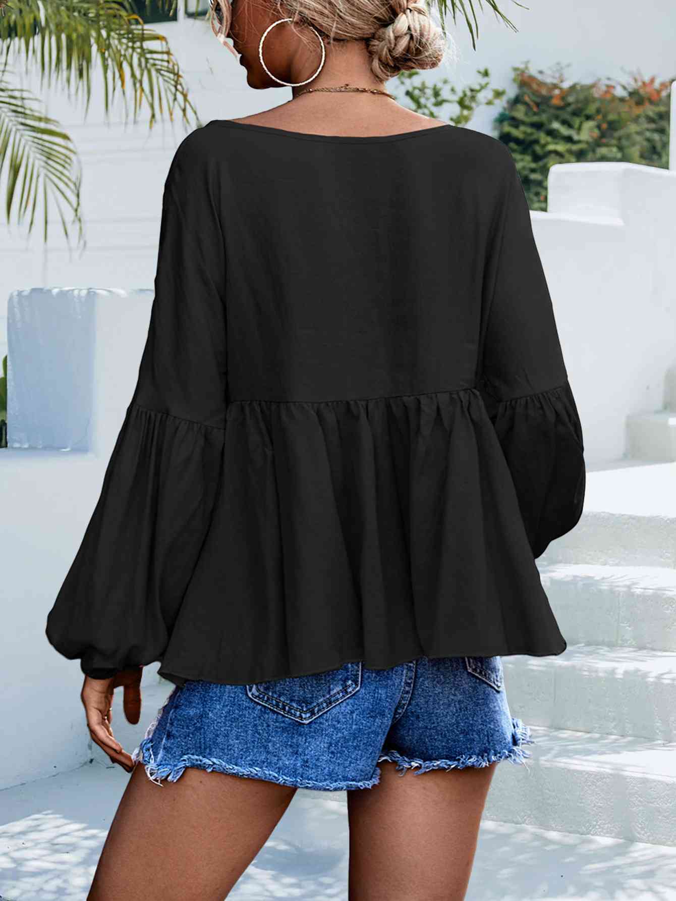 Blusa babydoll con mangas abullonadas