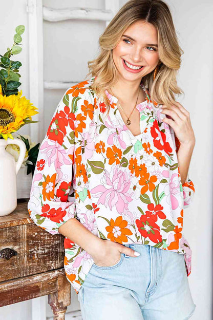 Blusa floral con cuello con muesca y manga globo