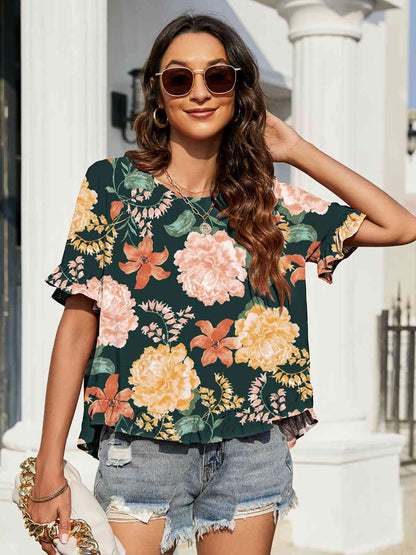 Blusa floral con mangas con volantes y volantes