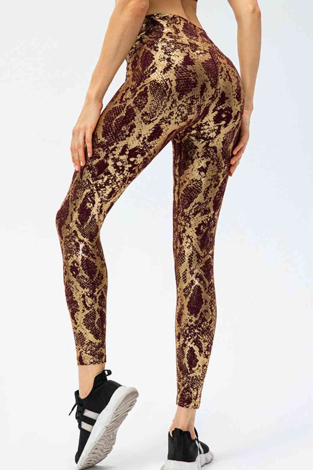 Pantalones deportivos largos con cinturilla ancha y corte slim con estampado animal