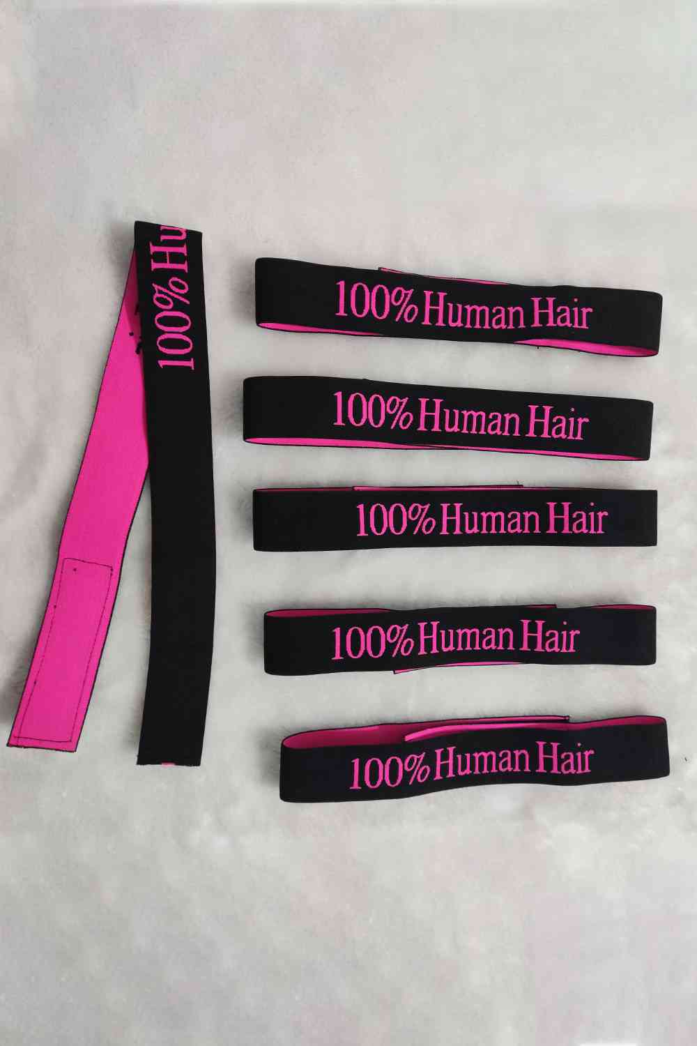 Paquete de 5 agarraderas elásticas para peluca con letras