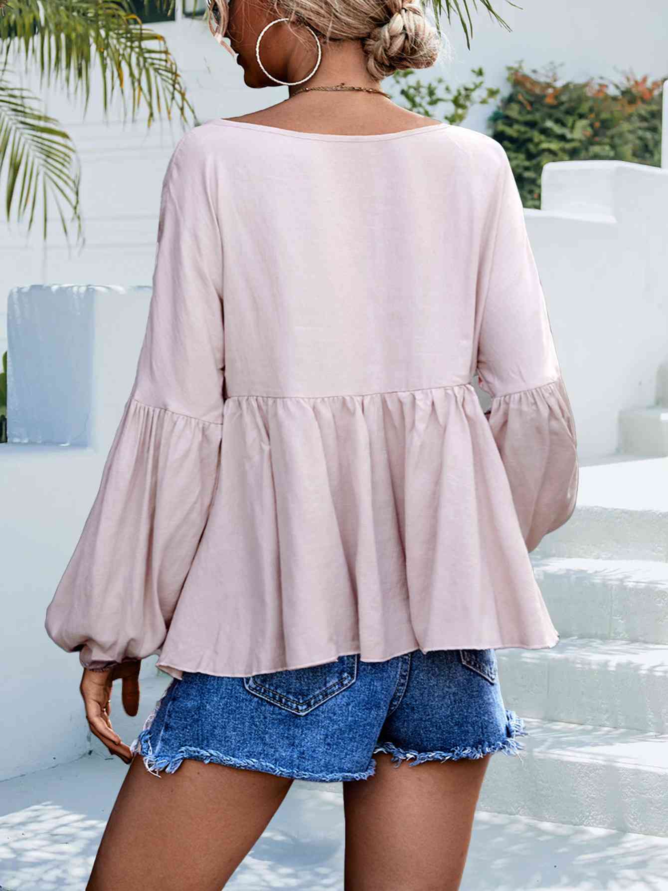 Blouse babydoll à manches bouffantes