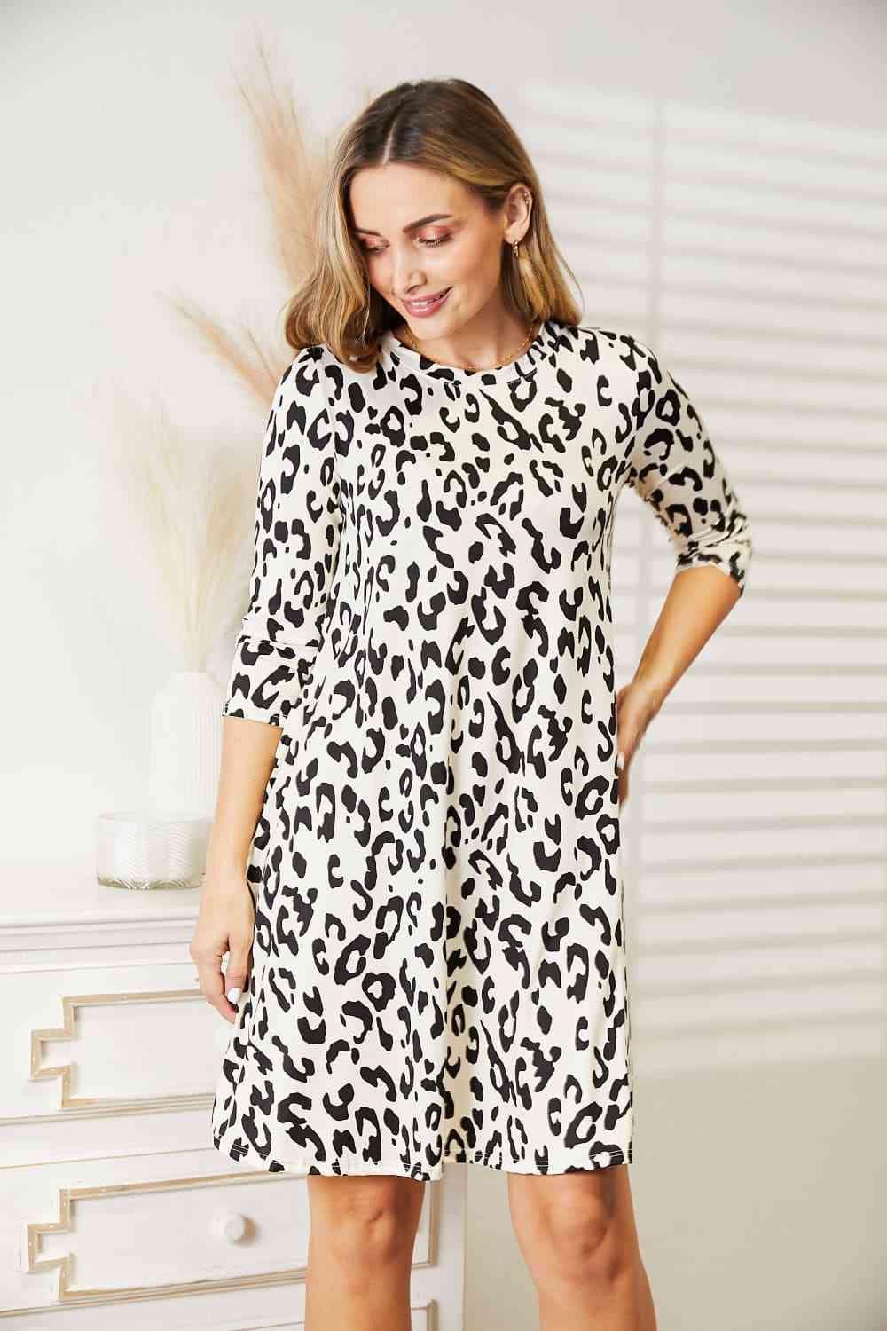 Celeste Vestido de manga tres cuartos de leopardo de tamaño completo con bolsillos