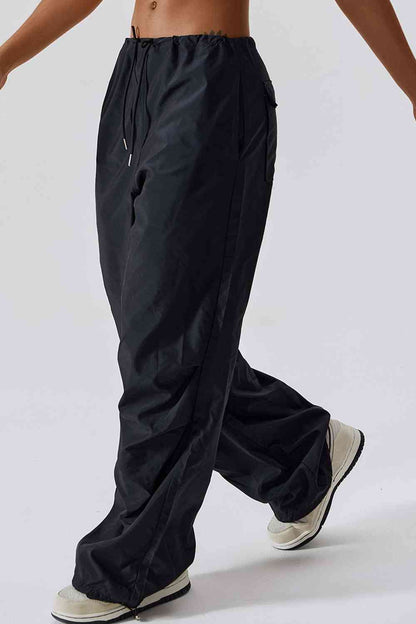 Pantalon de sport long avec poches, coupe ample