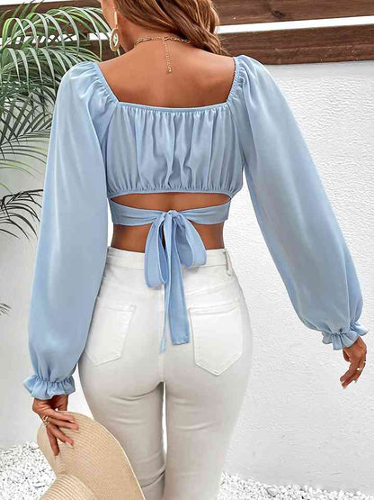 Blusa corta de manga raglán