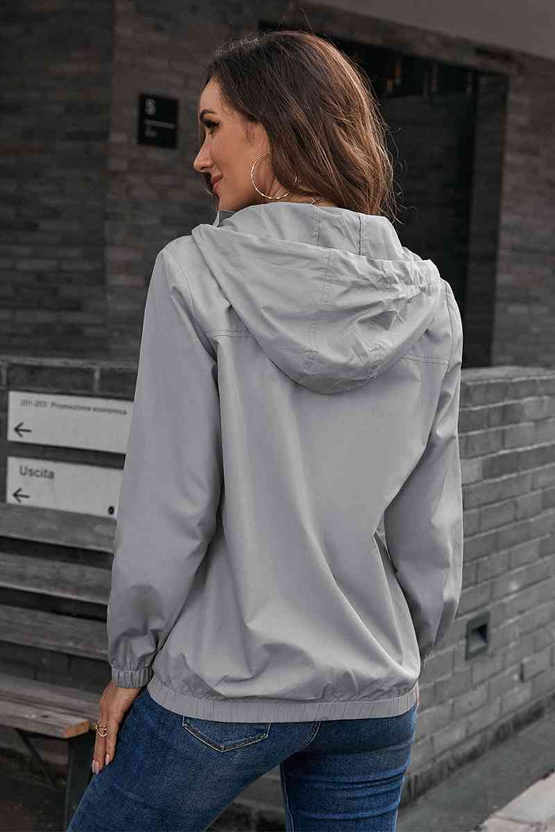 Chaqueta deportiva de manga larga con botones