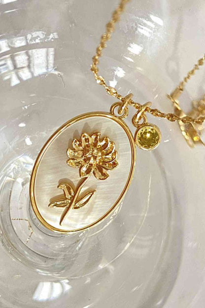 Collier en cuivre avec pendentif en forme de coquille de fleur