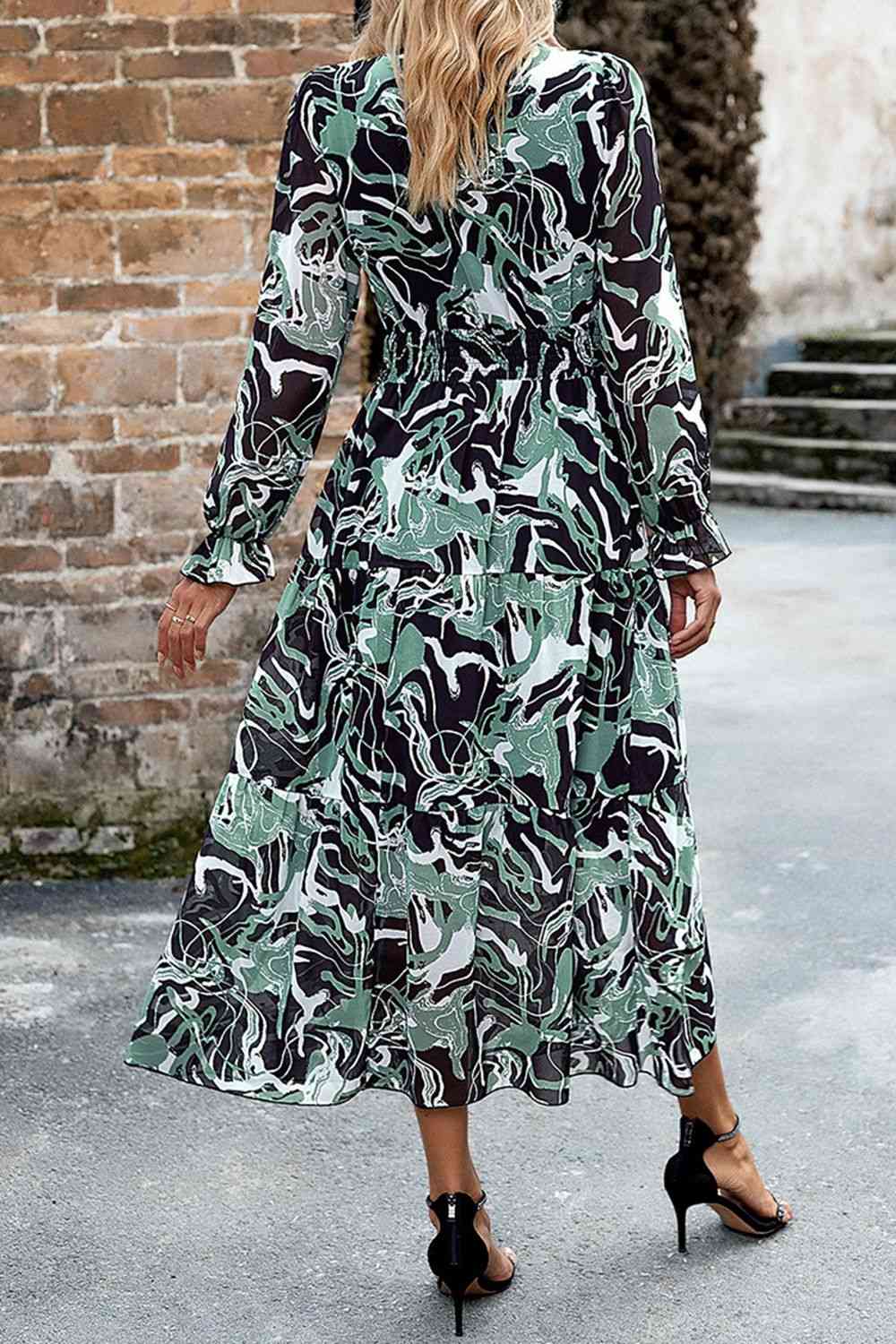 Robe midi imprimée à col surplis et manches volantées