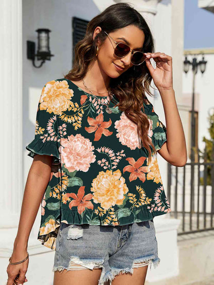 Blusa floral con mangas con volantes y volantes