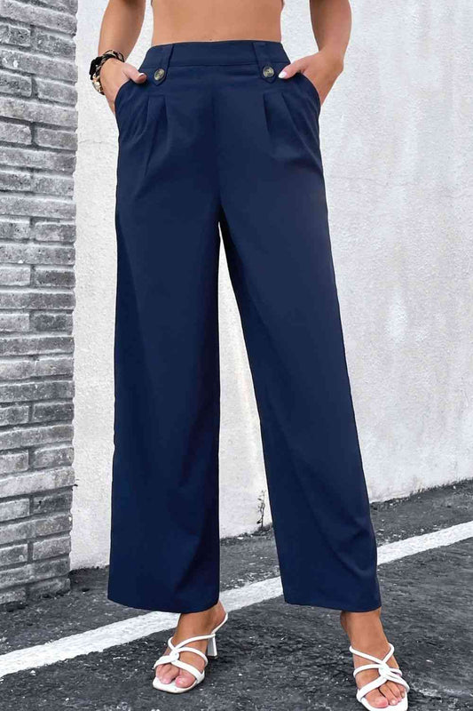 Pantalones anchos con cintura plisada y talle alto