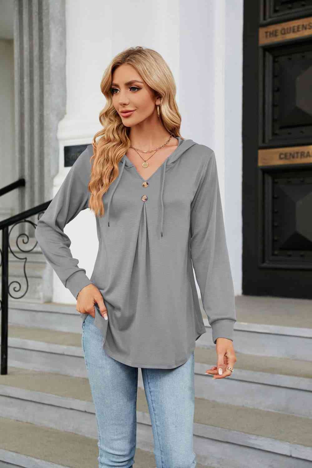 Blusa con capucha de manga larga