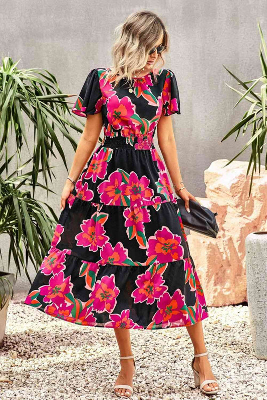 Vestido midi escalonado con mangas abullonadas y estampado floral