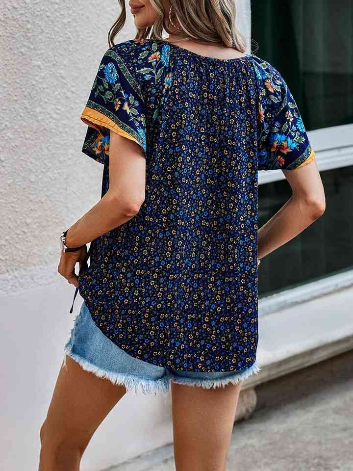 Printed Short Sleeve Tie Neck Blouse